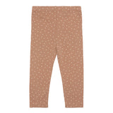 Pantalon bébé brun à pois blancs.