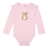 Body bébé rose à motif ourson et encolure à volants.