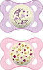 Deux sucettes MAM rose et mauve, motifs lune et étoiles, 0-6 mois.