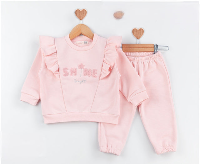 Ensemble bébé rose: sweat à volants et pantalon de jogging assorti