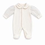 Combinaison bébé crème à col chemise, fermeture boutonnée et manches en tulle