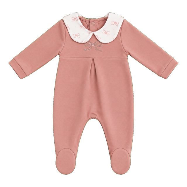 Combinaison bébé rose à longues manches, col volant blanc à motifs, pieds intégrés