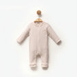 Combinaison bébé rose pâle à fermeture pression, manches longues