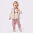 Veste matelassée bébé Loven rose clair, fermeture zippée et poches