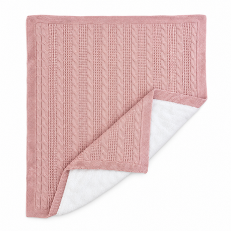Couverture rose en maille côtelée, revers blanc, bord roulé