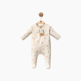 Combinaison bébé manches longues ivoire à motifs floraux rouges, fermeture boutonnée