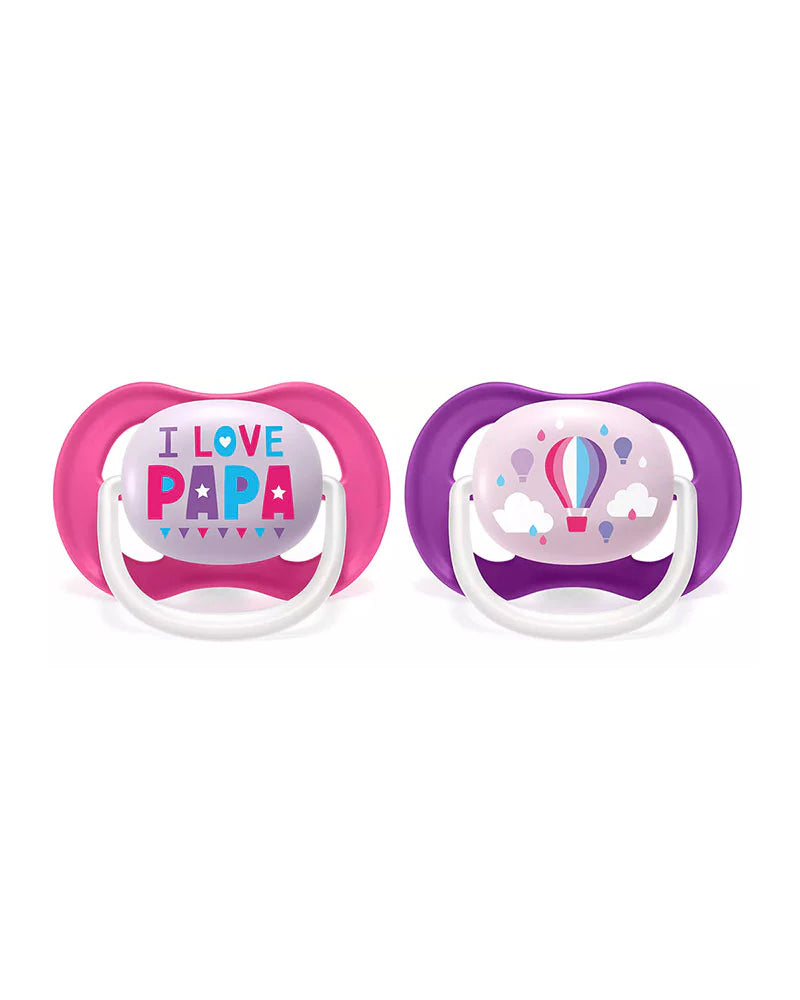 Deux sucettes orthodontiques Ultra Air, I Love Papa, embouts roses et violets