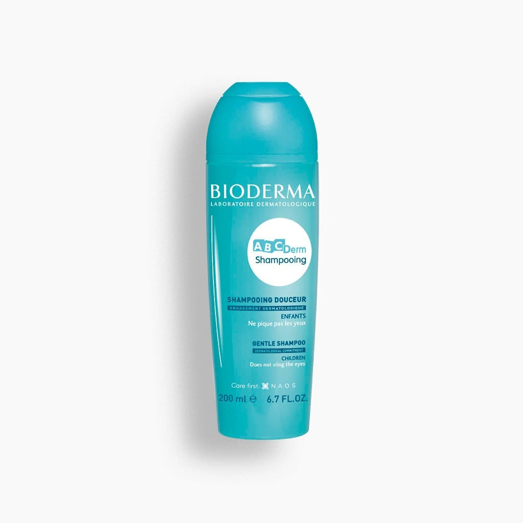 Shampoing BIODERMA ABCDerm en flacon bleu turquoise, 200 ml